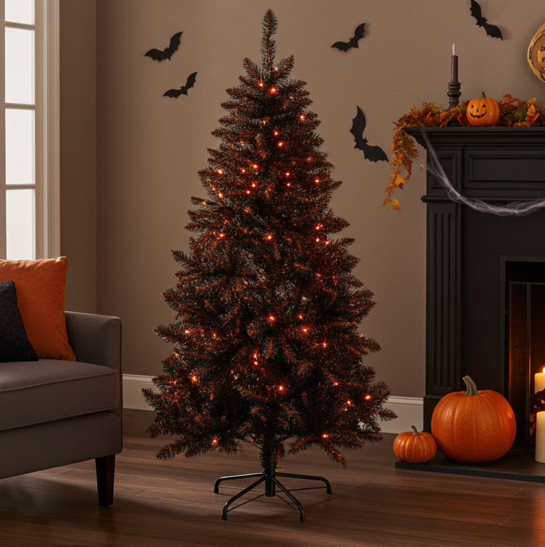 Halloween-themed room with a decorated tree, pumpkins, and fireplace.