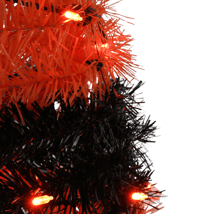 cloe up shot of black and orange tinsel