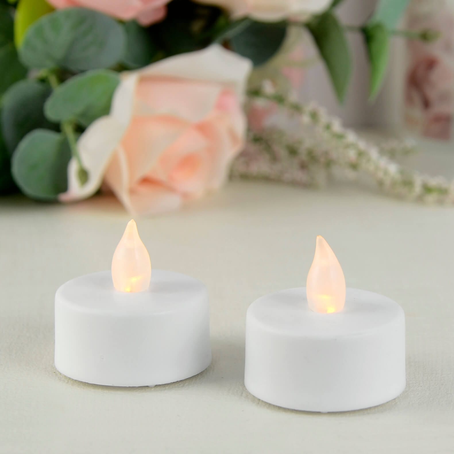 Pack Of 24 LED Tea Lights Battery Flicker Flame White XSStock.co.uk