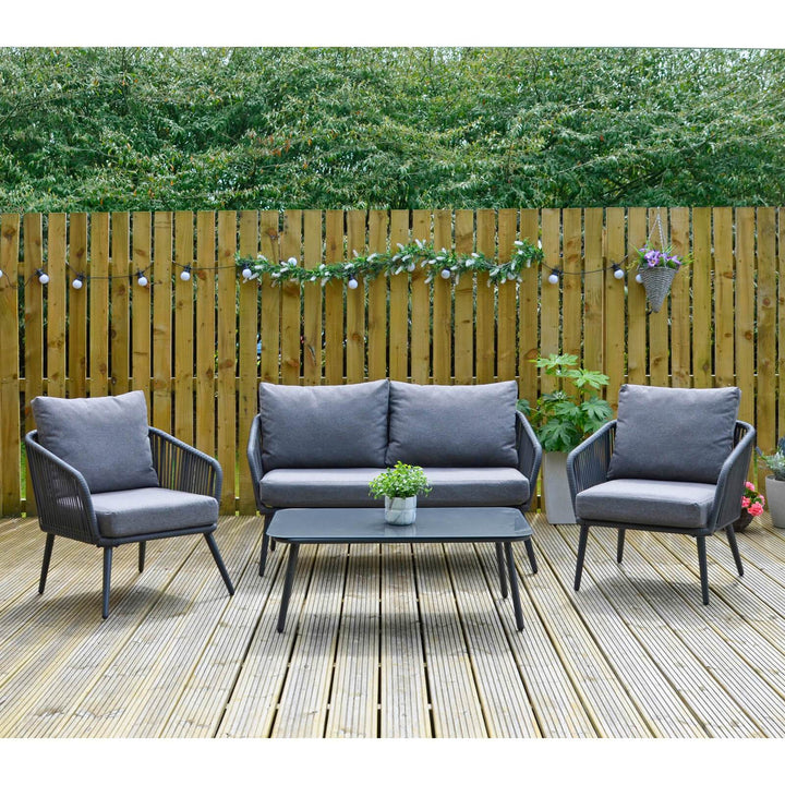 black/grey teramo rope furniture set on wooden decking space beside planters, flower garlands and hanging flower boxes