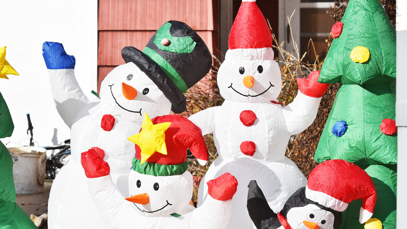 christmas inflatables together in outdoor location in day light