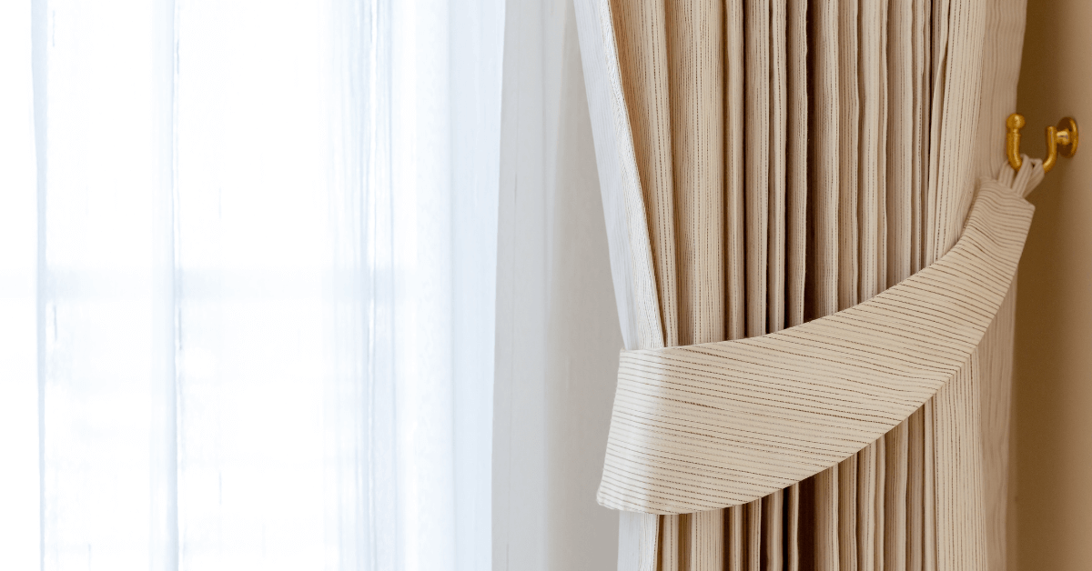white sheer curtain voile panel over large window