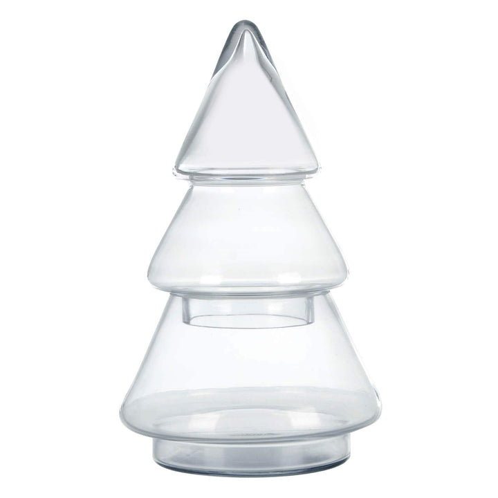 glass christmas tree shaped storage jar on white background