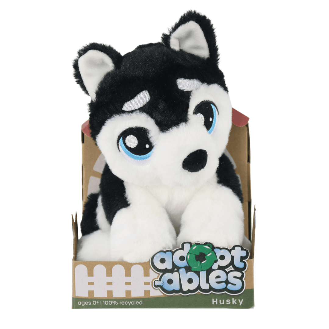 adoptables soft black and white husky dog toy in kennel style cardboard packages with ages 0+ and 100% recycled on packaging