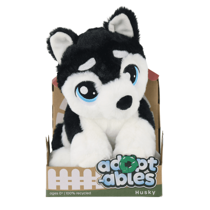 adoptables soft black and white husky dog toy in kennel style cardboard packages with ages 0+ and 100% recycled on packaging
