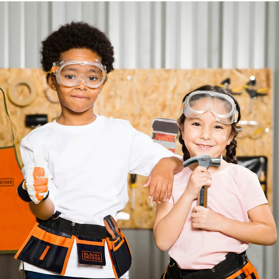 Boy and girl holding kids tools for DIY fun