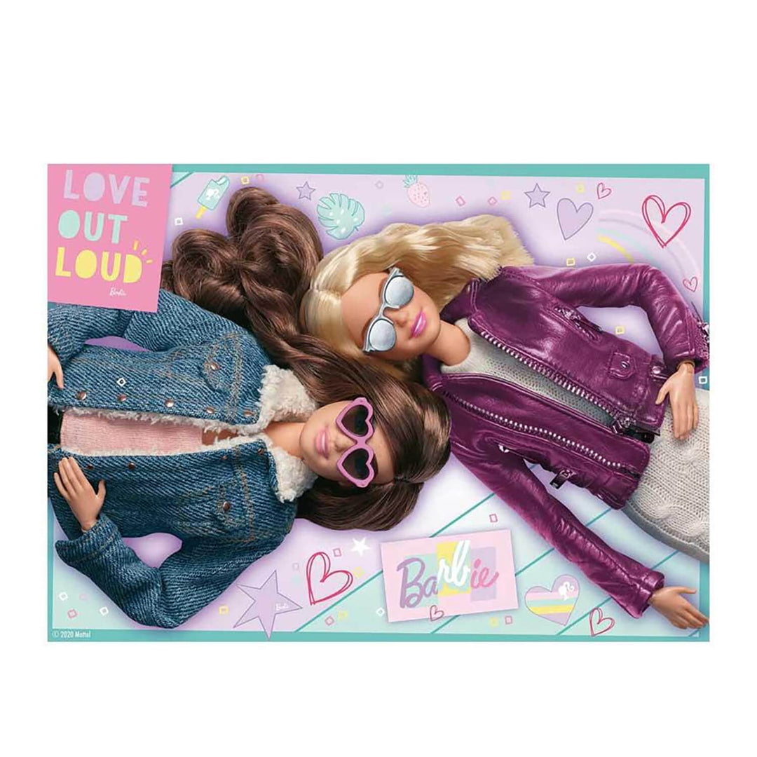 2 Barbie dolls lying down with Love out Loud slogan
