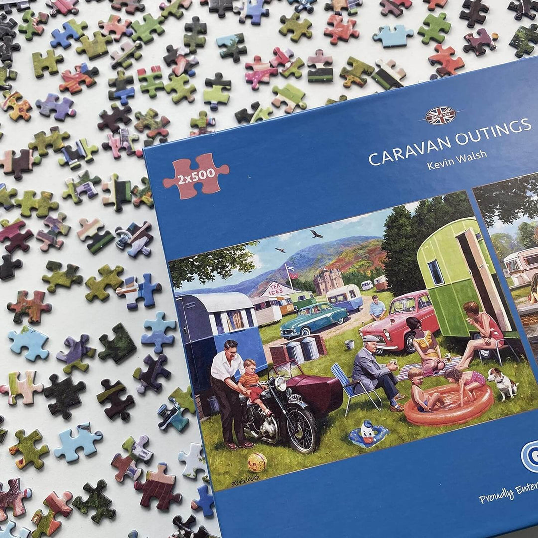 Box of 2 caravan outings scenes jigsaw puzzles with lots of pieces aroound the box