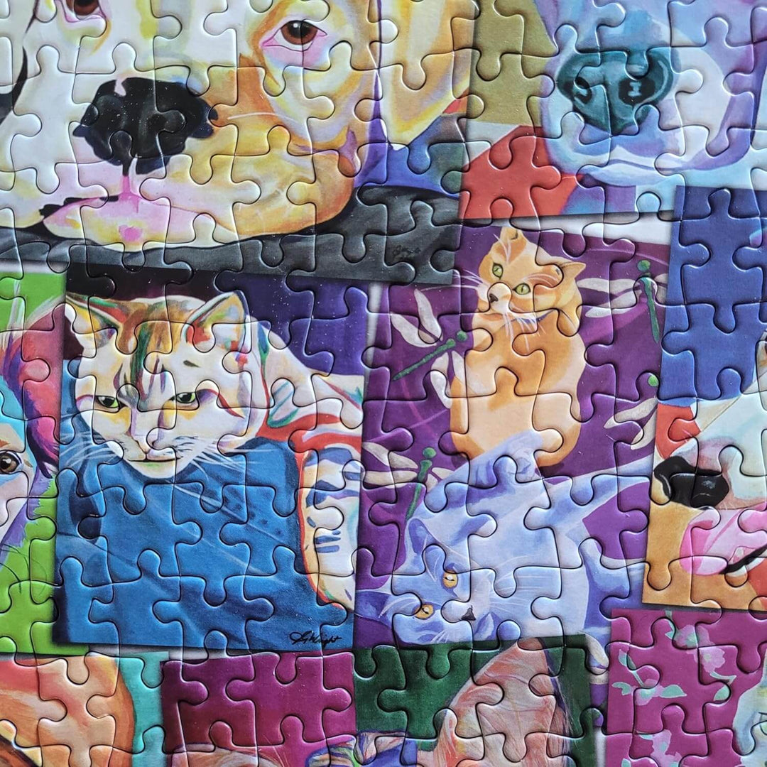 Sction of a completed cats and dogs jigsaw puzzle