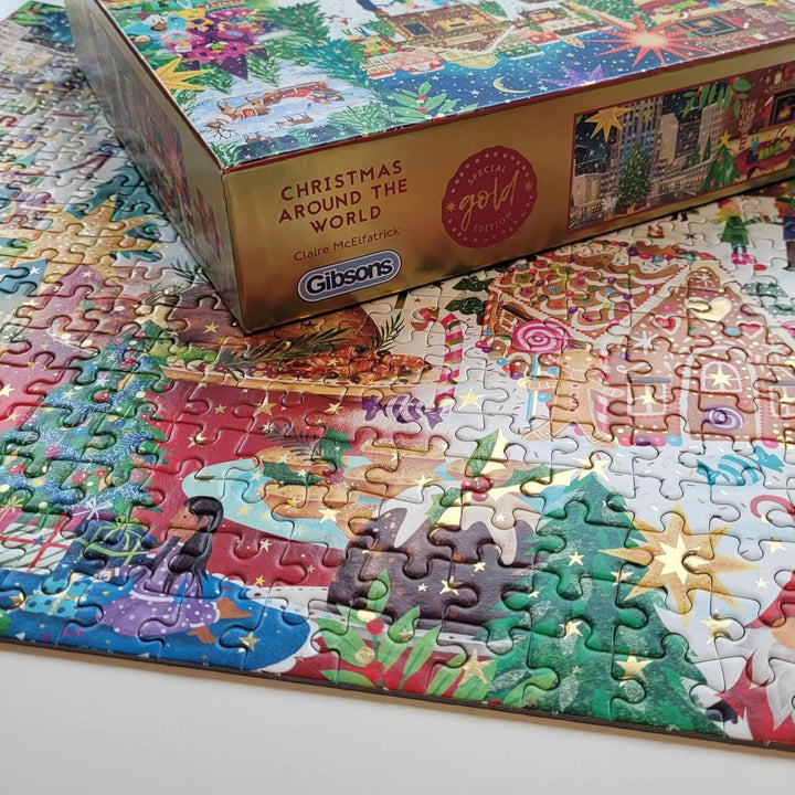 Close up of a completed Christmas jigsaw puzzle with gold foil pieces