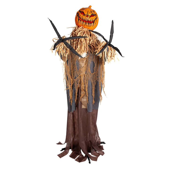 evil scarecrow figure with big orange pumpkin head