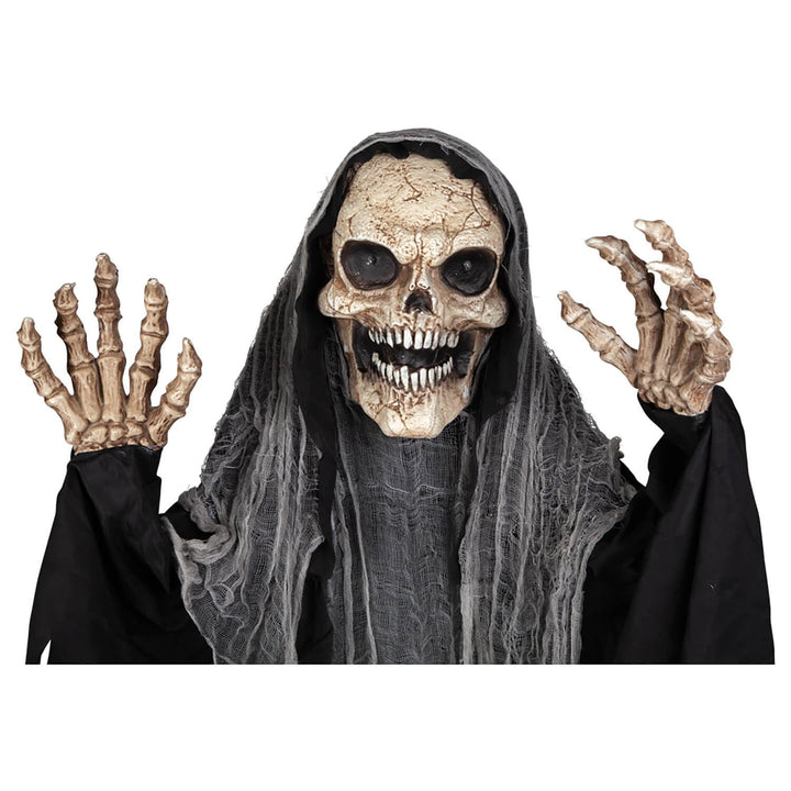 Close up of graveyard grim reaper skeleton figure Halloween decoration