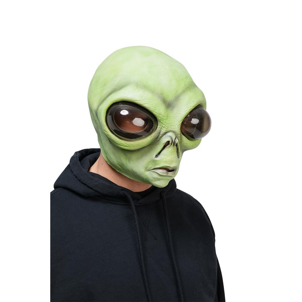 Person wearing a green alien mask with a black hoodie on a white background