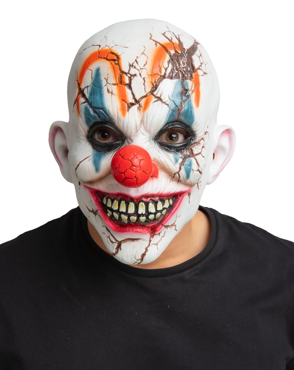 Person wearing a detailed clown mask with white face, red nose, and black and orange makeup on a white background.
