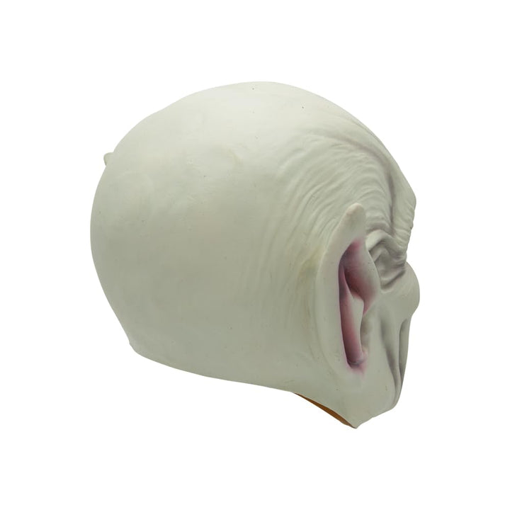 Back of a demon latex mask on a white background