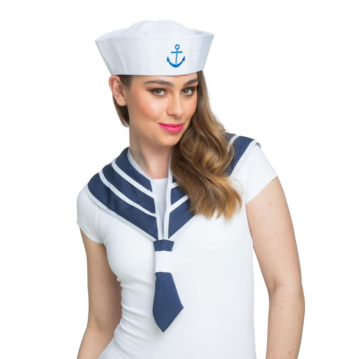 Woman wearing a sailor costume with a white hat and blue accents on a white background
