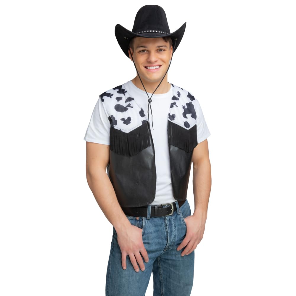 Person wearing a black and white cow print vest with fringes on a white background