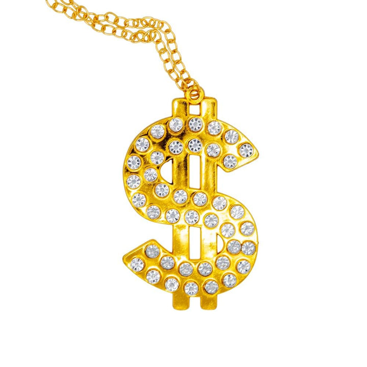 Gold necklace with a dollar sign pendant featuring clear stones on a white background