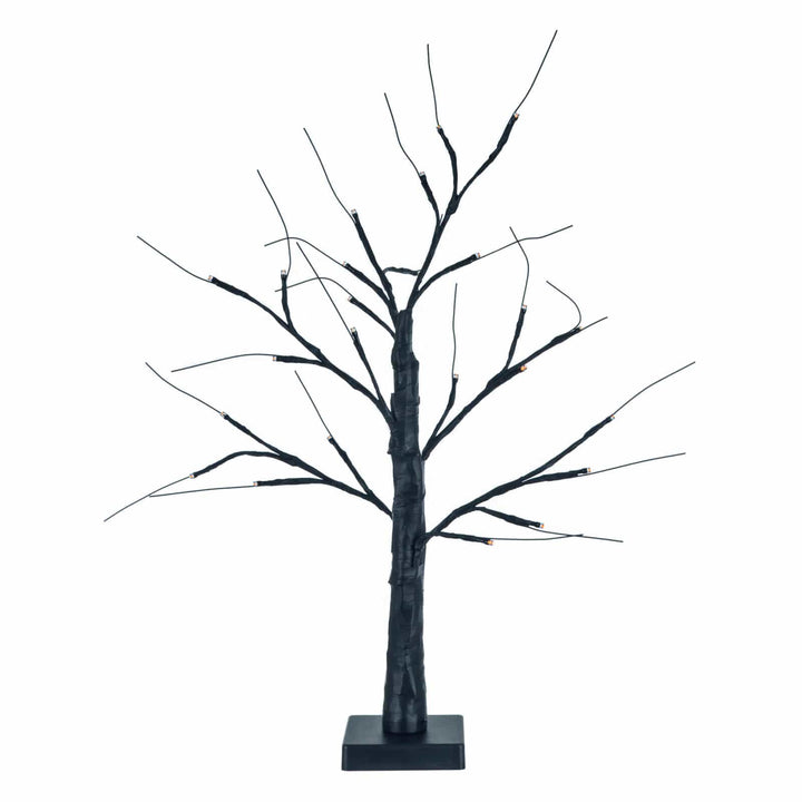 Decorative black Halloween mini twig tree with orange lights on a white background