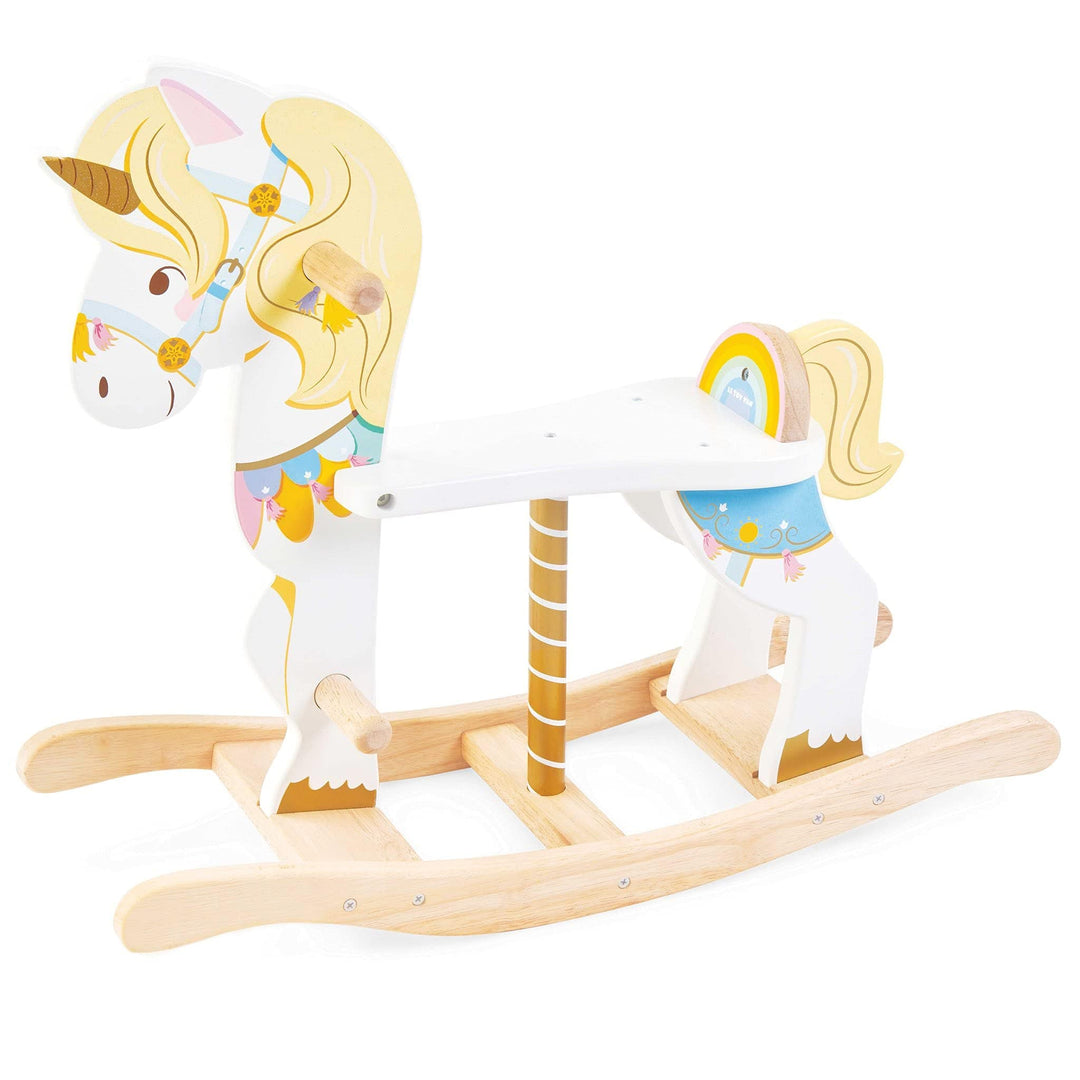 Wooden rocking horse with unicorn design on a white background