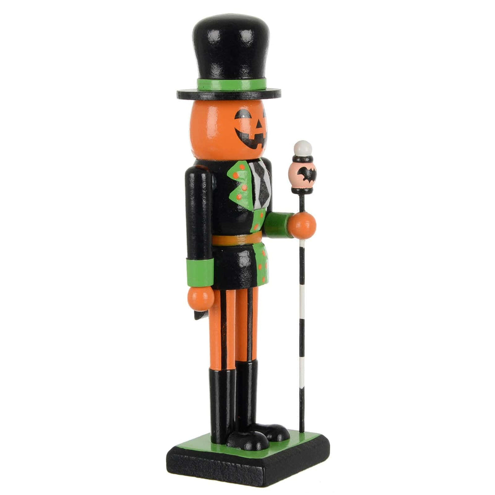 Side view of a Nutcracker soldier with pimkin face Halloween decoration