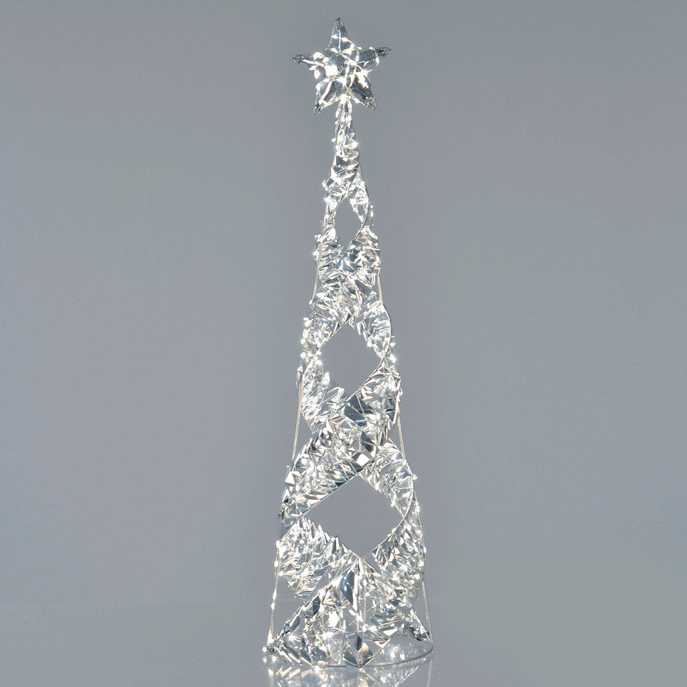 Silver foil spiral light up Christmas tree on grey background