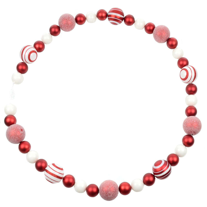 Red and white Christmas bauble garland in a circle