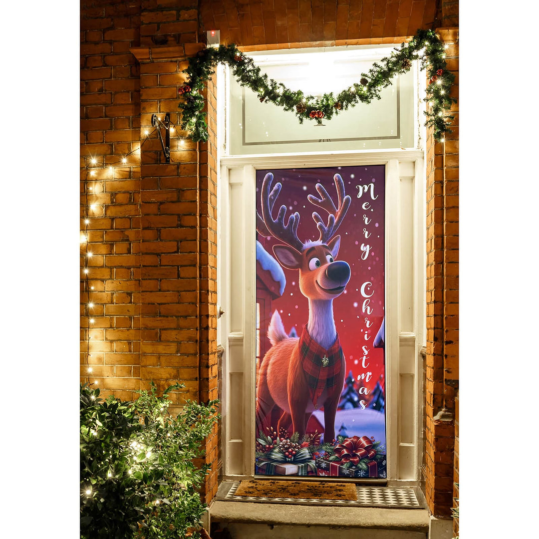 Decorative Christmas door with reindeer design and 'Merry Christmas' text on a brick wall background.
