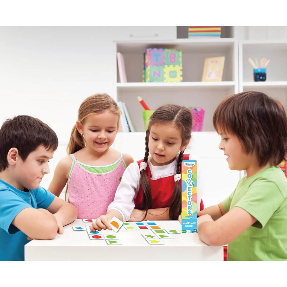 4 children playing a game of Connectors shapes and colours