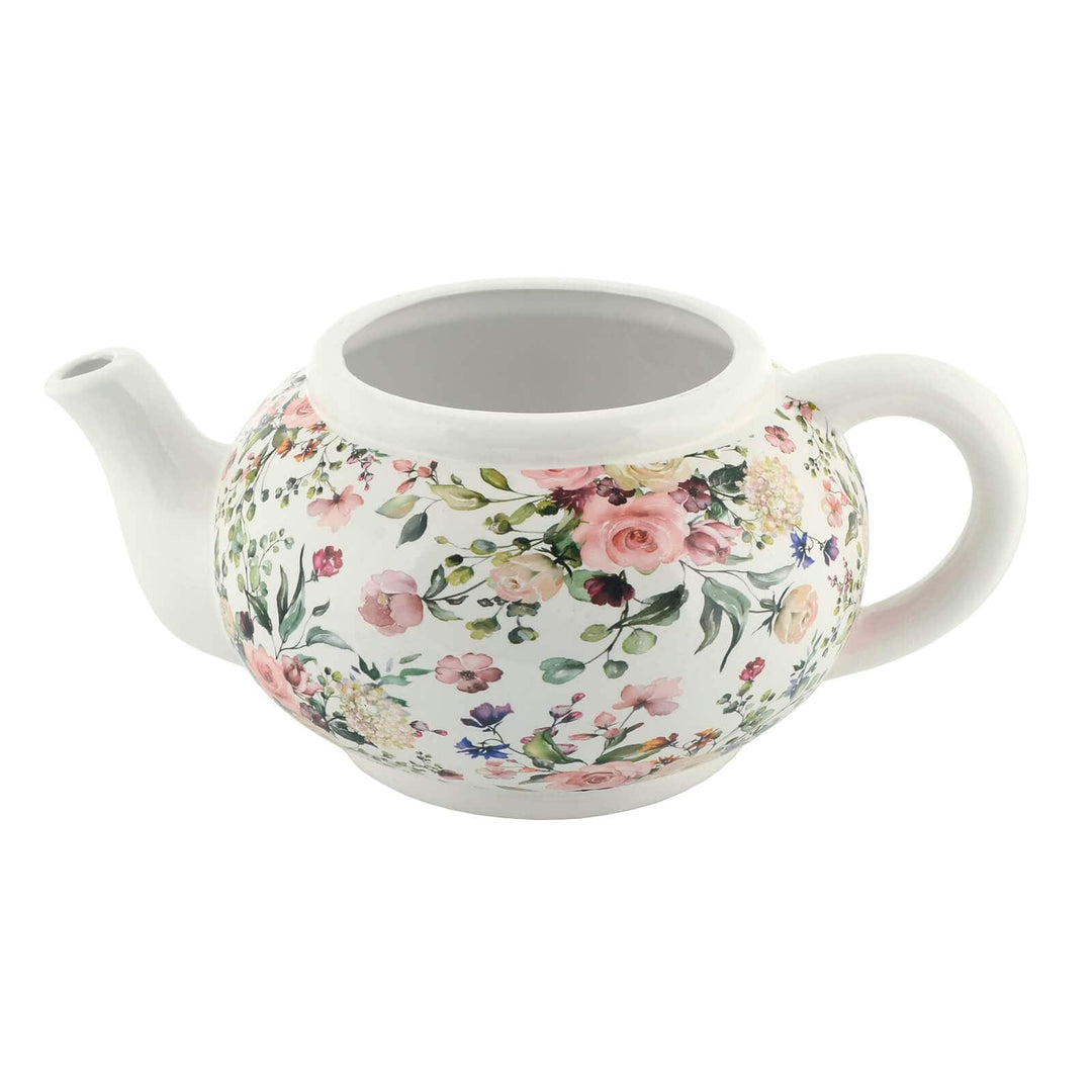 White teapot planter with rose floral pattern