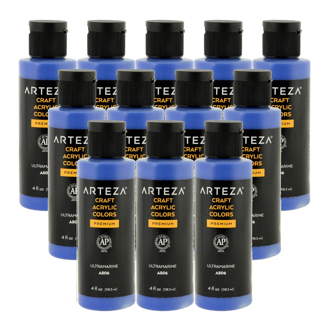 12 bottles of ultramarine blue acrylic paint on a white background