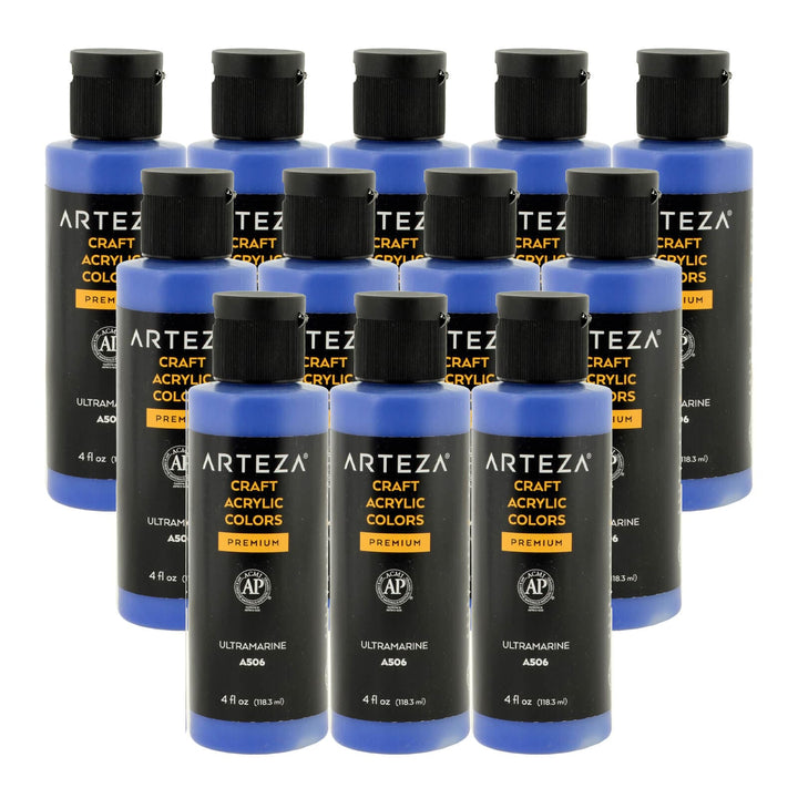 12 bottles of ultramarine blue acrylic paint on a white background