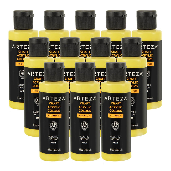 12 bottles of yellow acrylic paint on a white background
