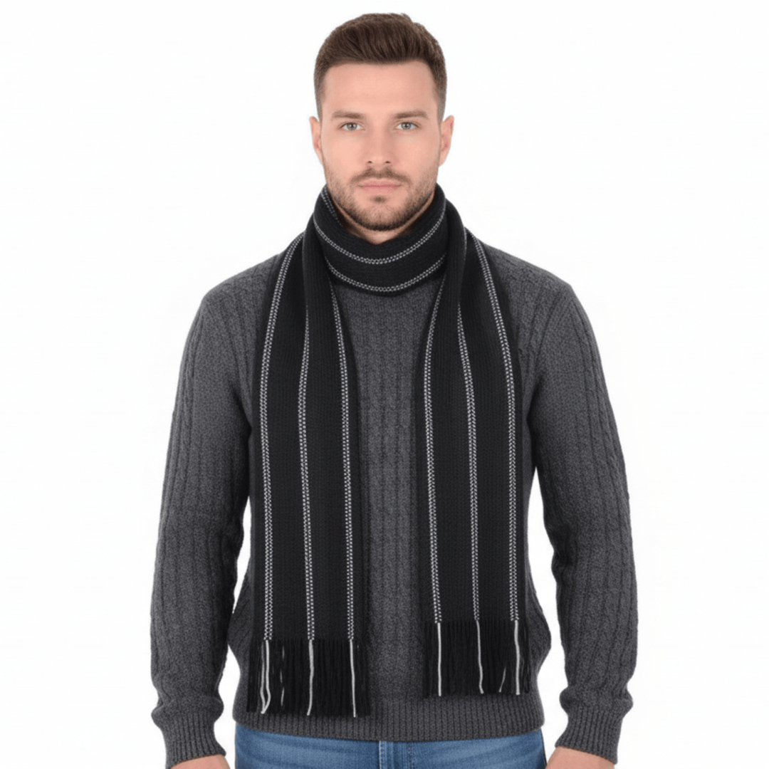 Man wearing a gray sweater and black scarf on a white background