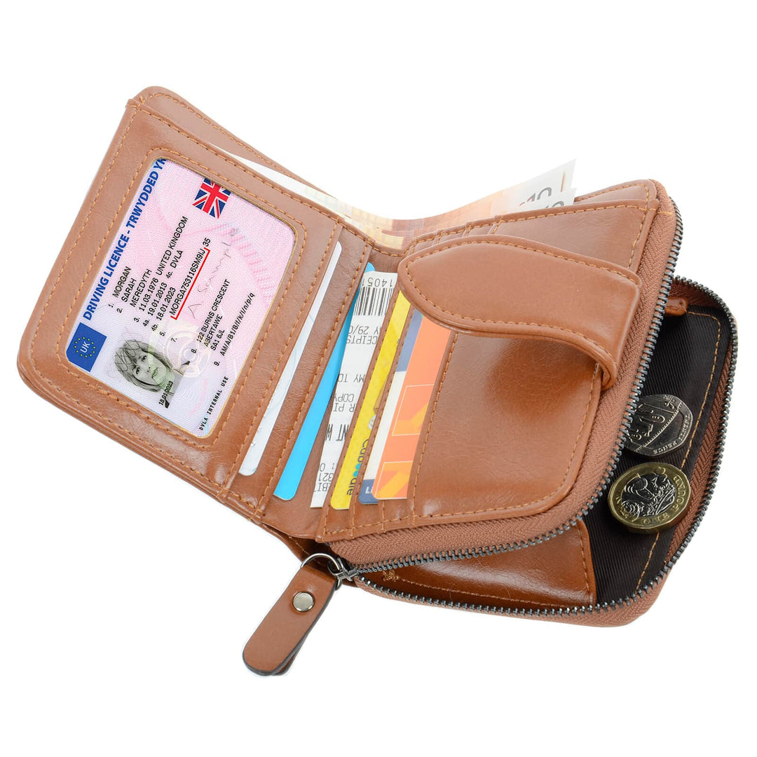 Brown purse with various cards and a coin on a white background