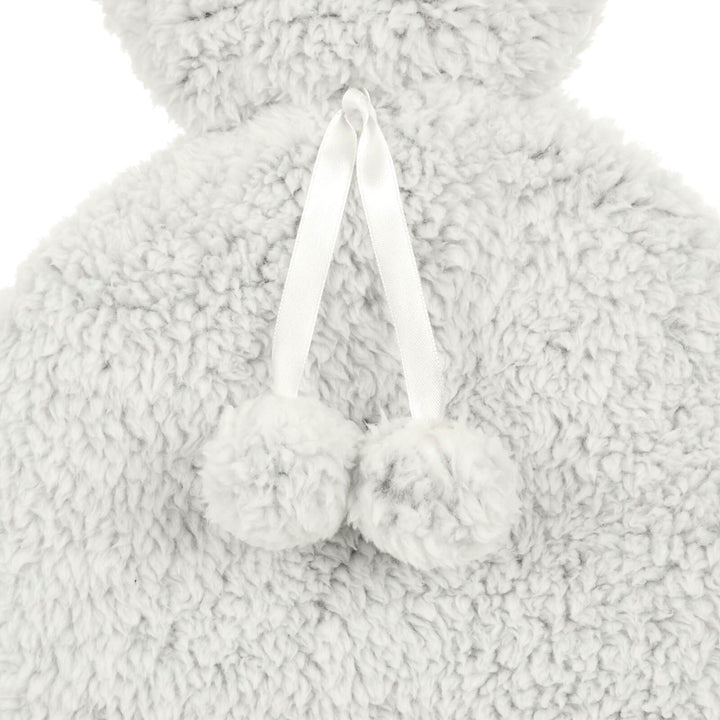 Close up of this grey sherpa fleece and pom poms