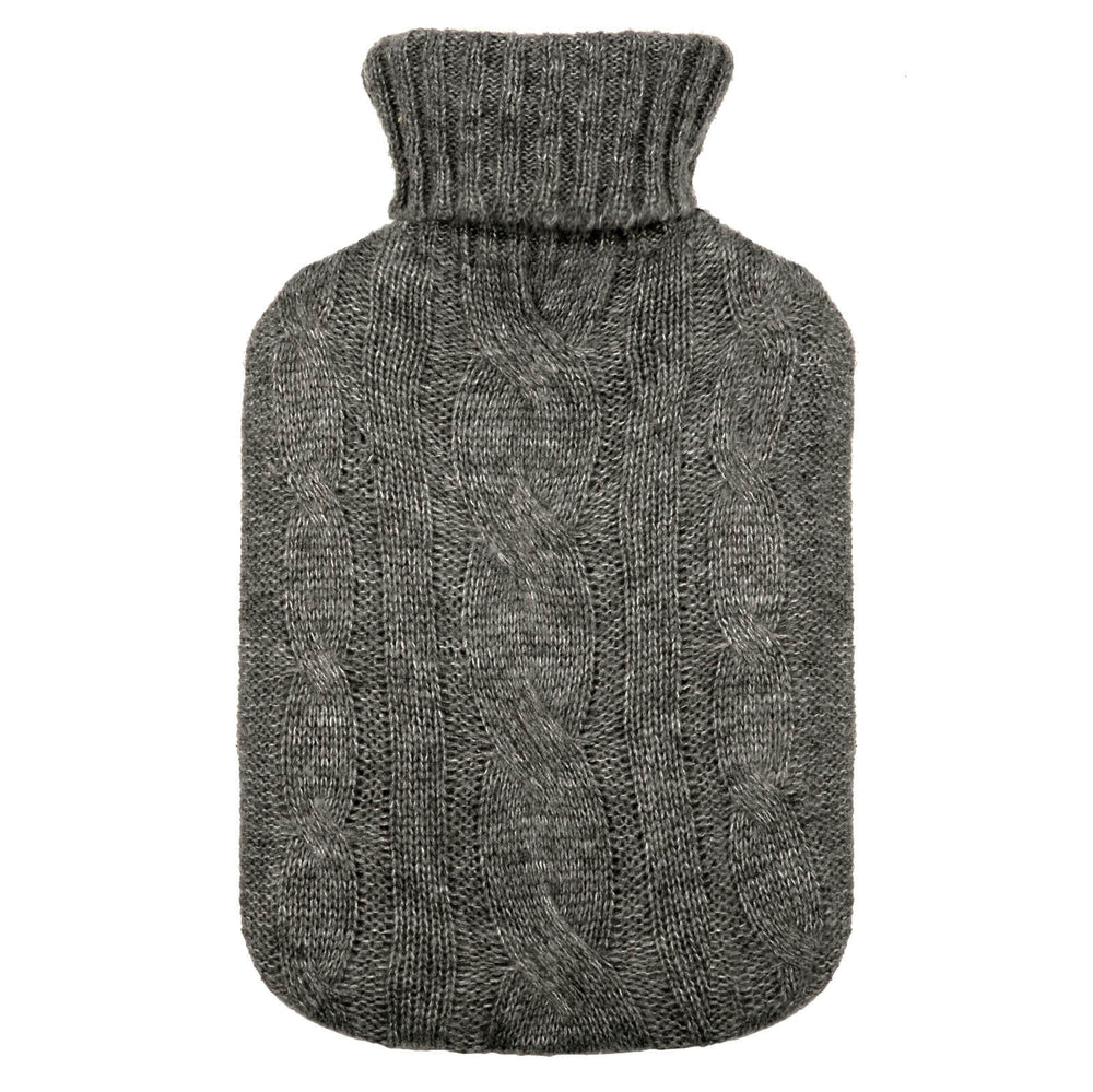Hot water bottle with a dark grey cable stitch pattern knitted cover