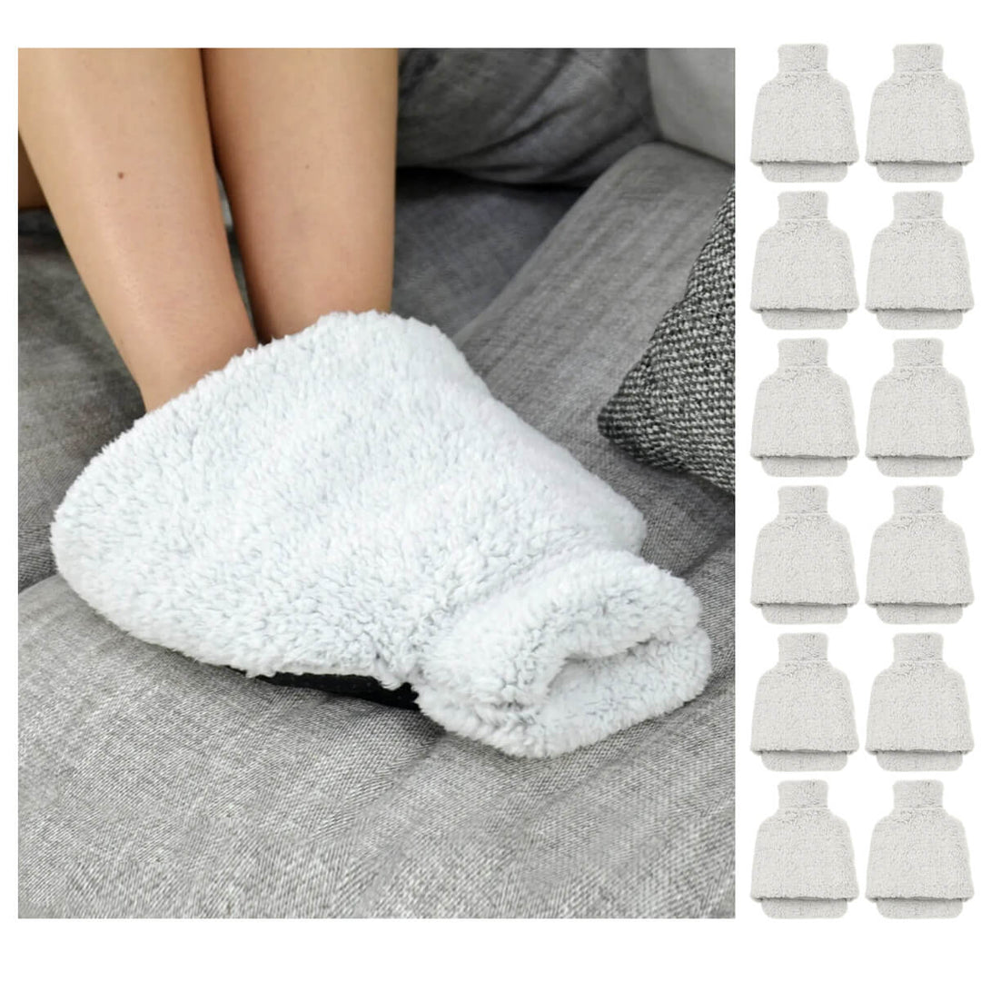 grey fleece hot water bottle for feet on a grey sofa