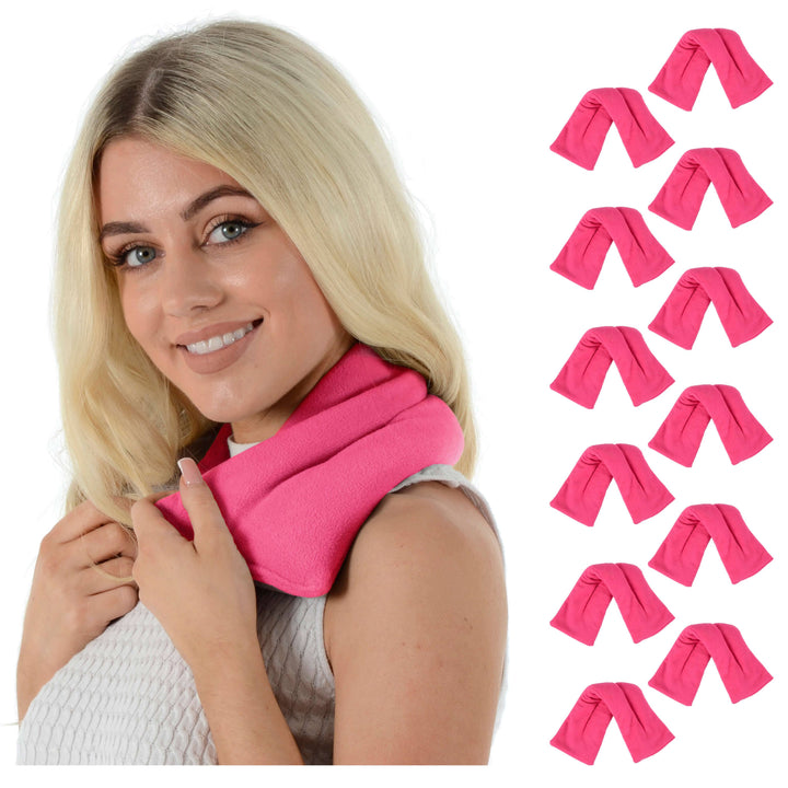 Woman wearing a pink neck heat pack with 12 heat packs displayed on a white background