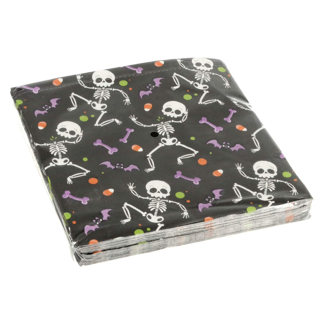 Pack of Halloween-themed paper napkins with skeletons and bones on a black background.