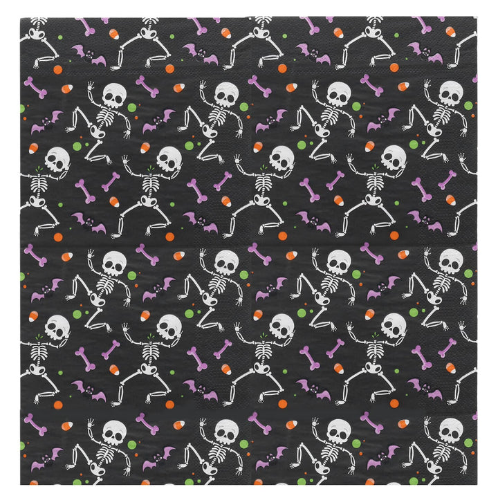 Pattern of skeletons and bones on a black background with colorful accents.