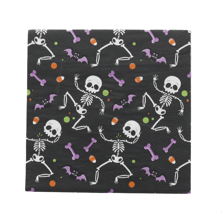 Black napkin with white skeleton design on a white background