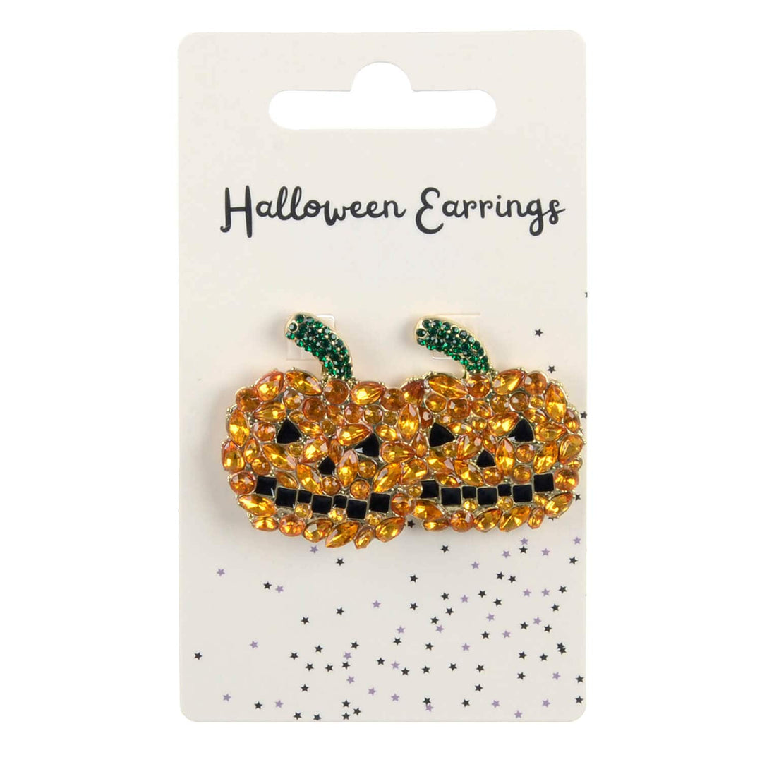 Halloween earrings shaped like jack-o'-lanterns on a branded card.