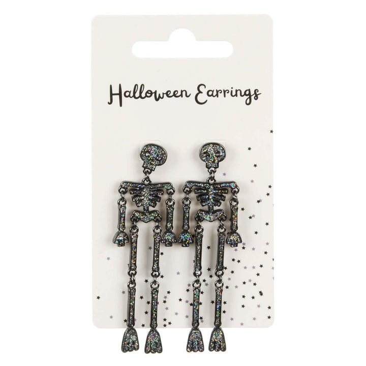 Display pack of long silver skeleton drop earrings on a white background