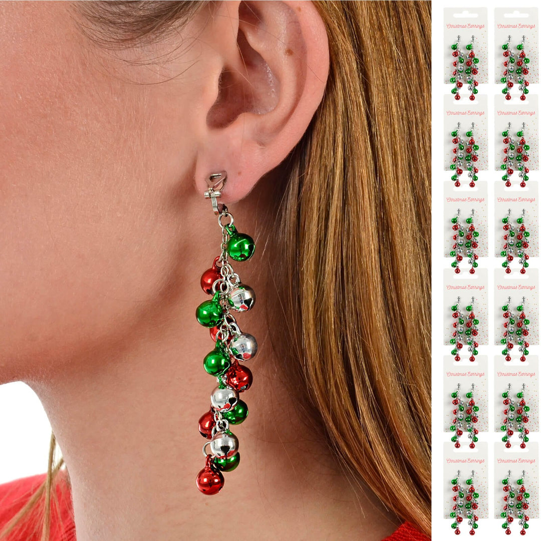 Person wearing a red green and silver jingle bells Christmas earring with 12 cards of earring down one side
