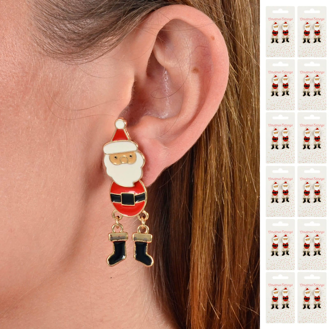 Person wearing  Santa Christmas earring with 12 display cards of Santa earrings down one side