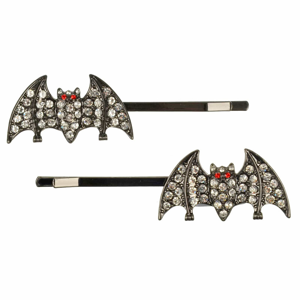 Bat-shaped hair pins with rhinestone details on a white background