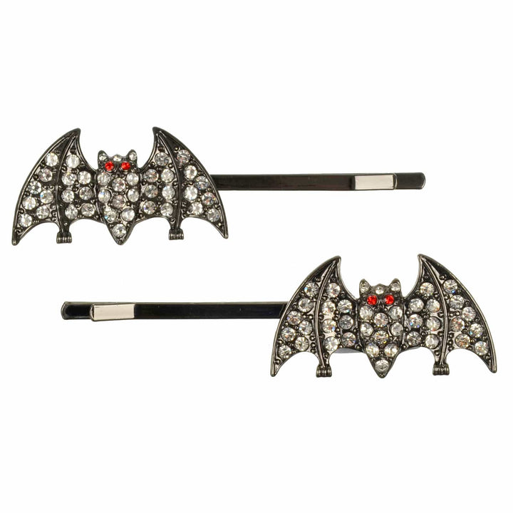 Bat-shaped hair pins with rhinestone details on a white background
