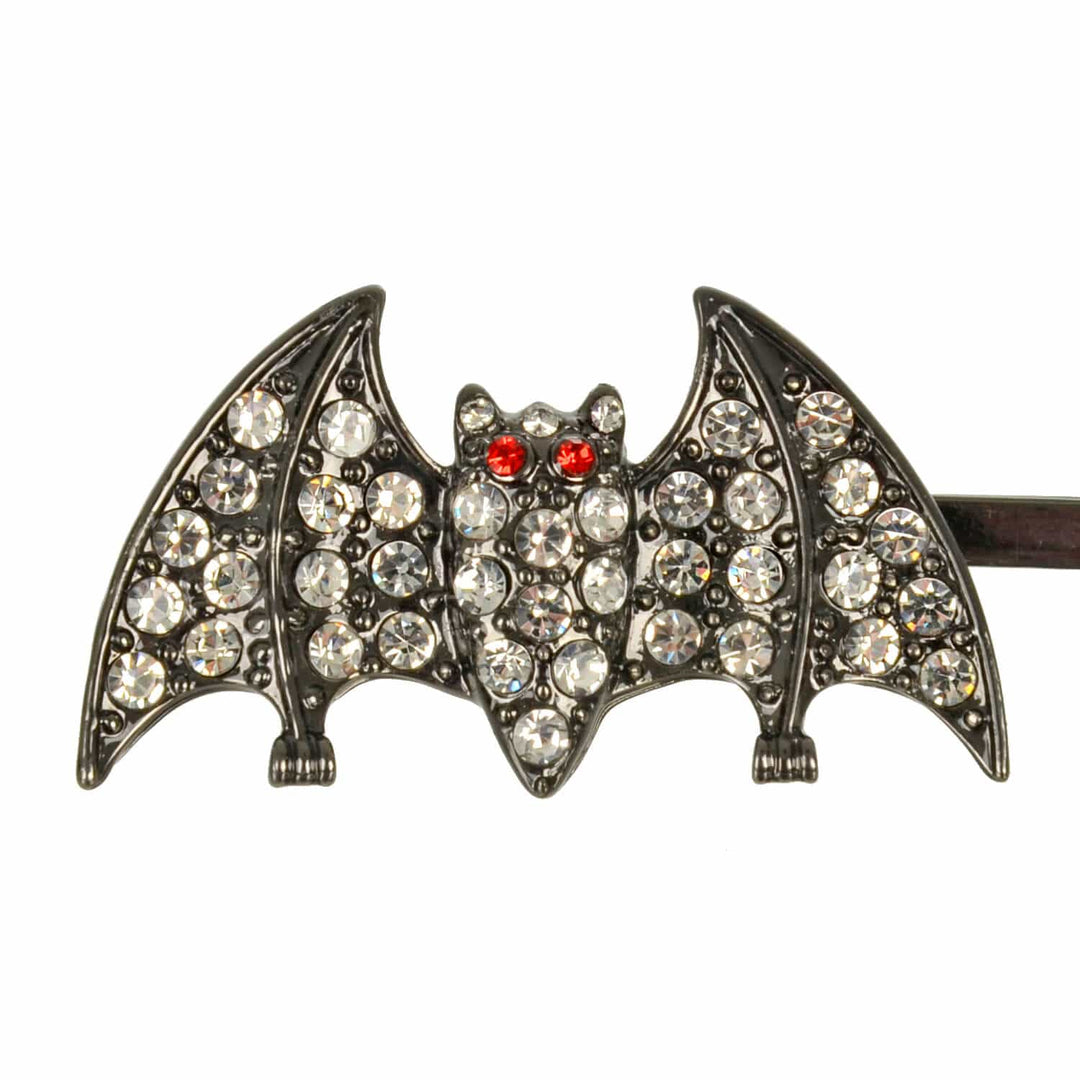 Bat-shaped hair clip with rhinestones on a white background