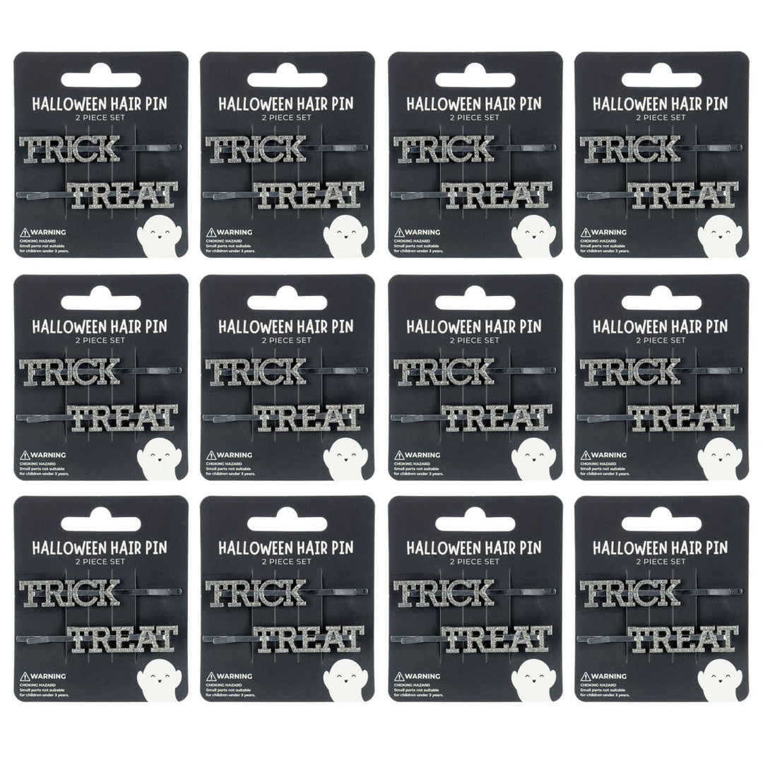12 display cards of Halloween hair pins with 'Trick Treat' text on a white background